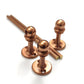 Brass Gallery Rail solid brass gallery rail components in a warm copper finish, featuring three mounting posts and two rods. Close-up view showing the genuine solid brass core at the cut ends. – view 2