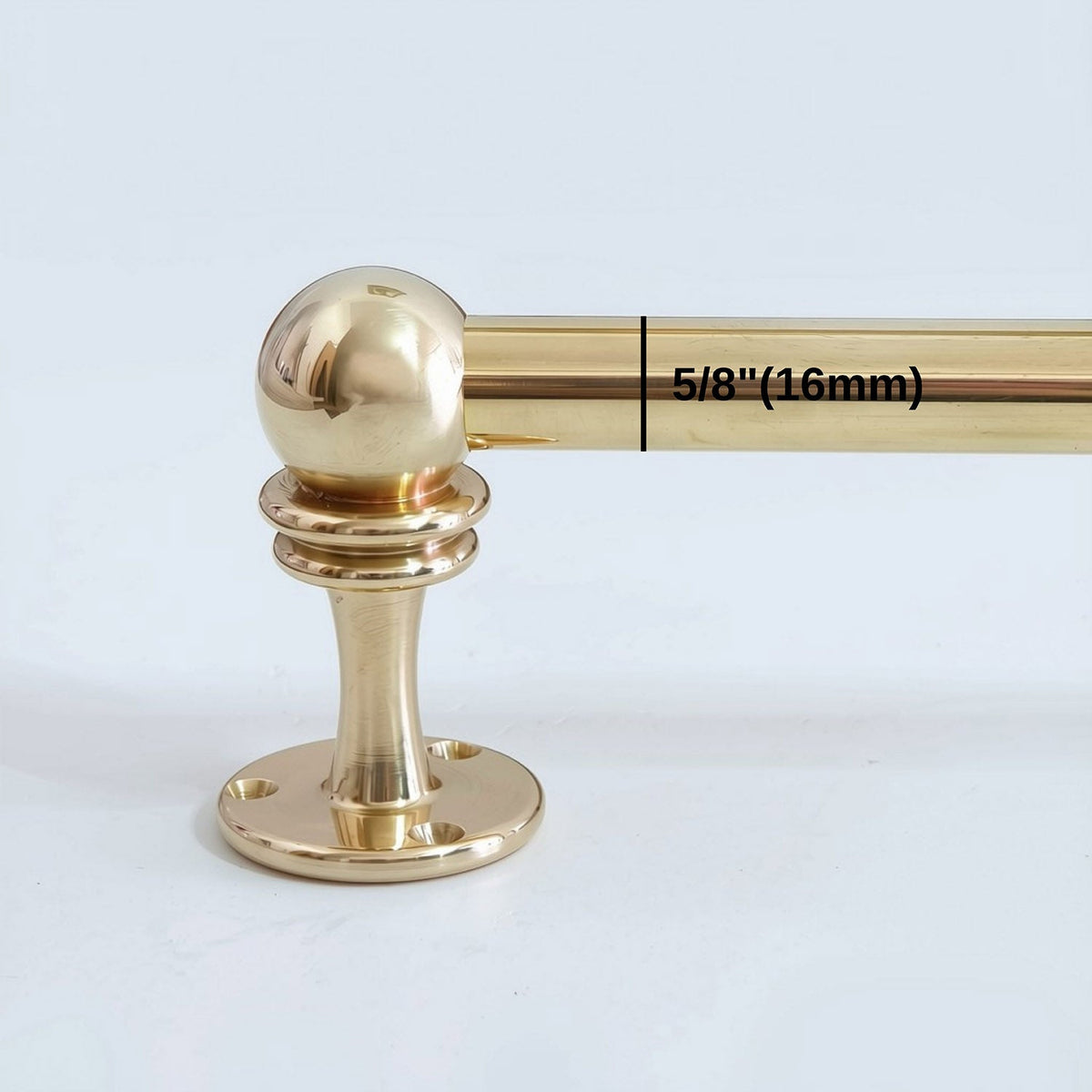 Technical dimensional close-up of a solid unlacquered brass kitchen rail showing 5/8 inch (16 mm) tube diameter and end bracket post.